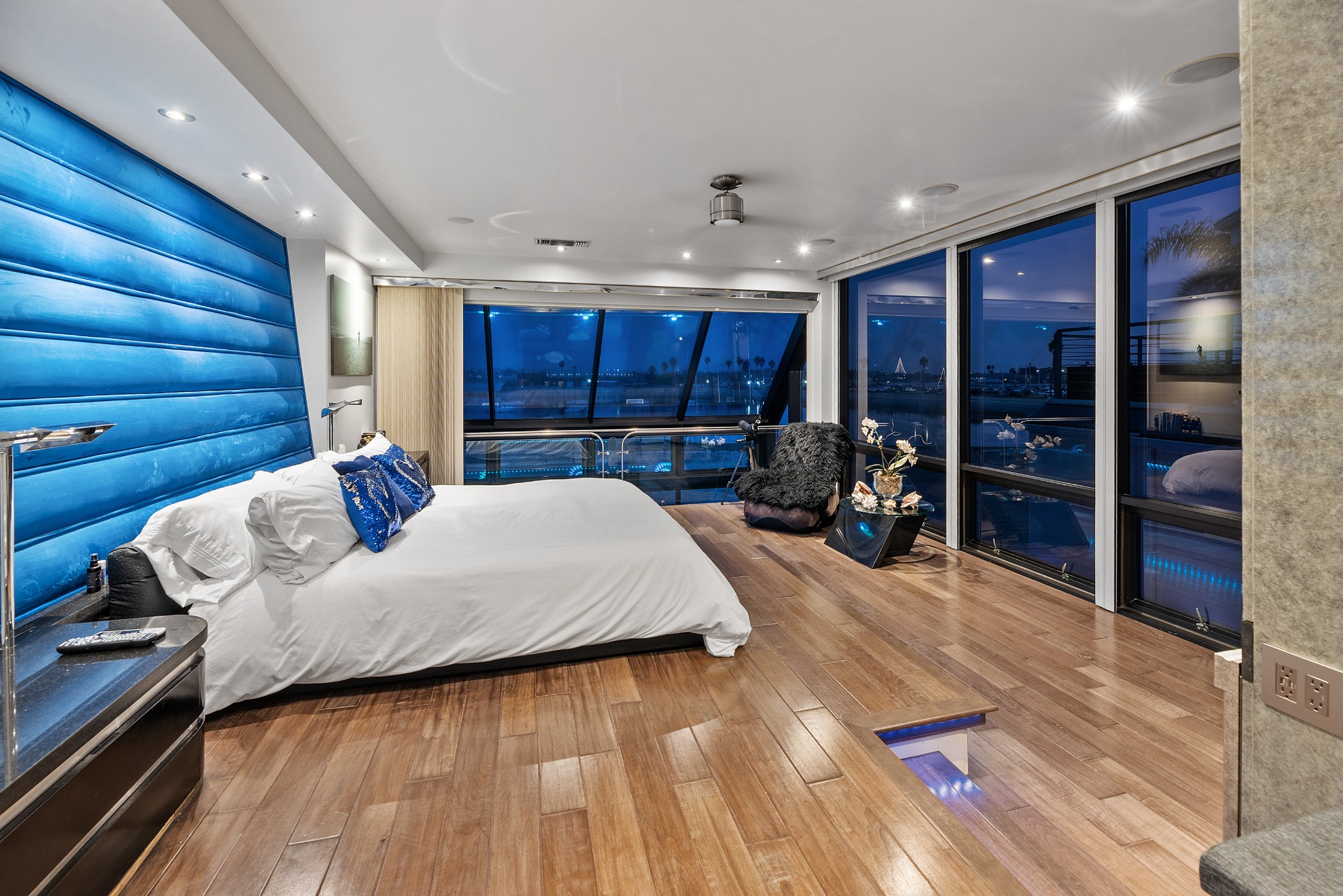 Bayside bedroom with blue accents and water views